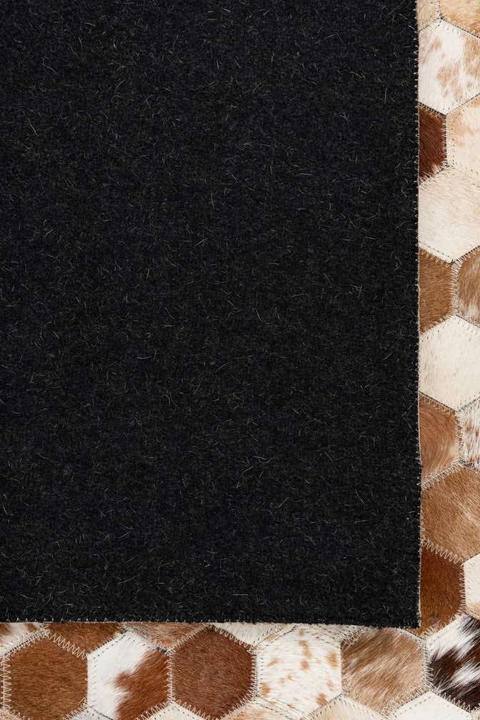 5' 2 x 8' 1 Cowhide Leather Rug