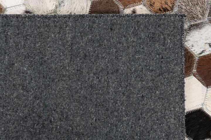 5' 1 x 7' 10 Cowhide Leather Rug