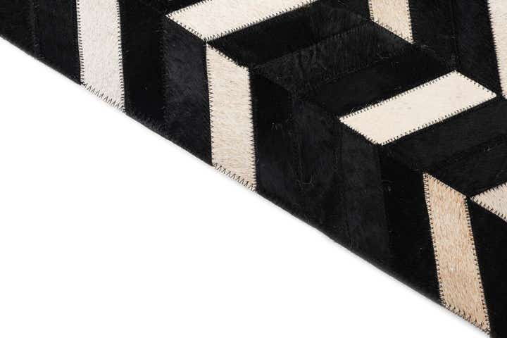 5' 1 x 8' 1 Cowhide Leather Rug
