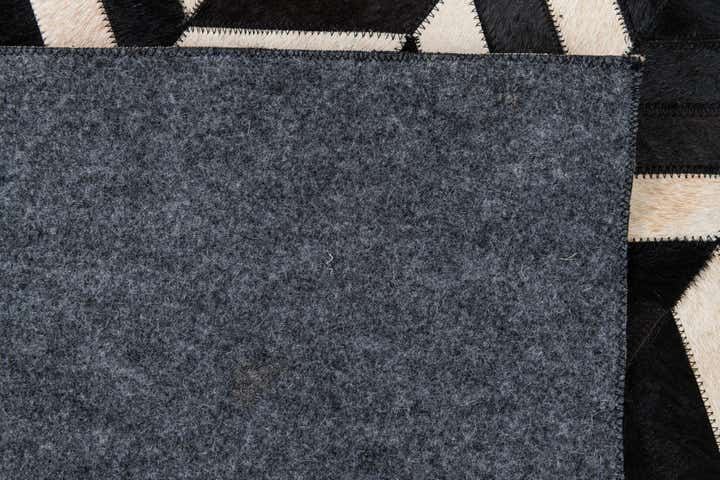 5' 1 x 8' 1 Cowhide Leather Rug