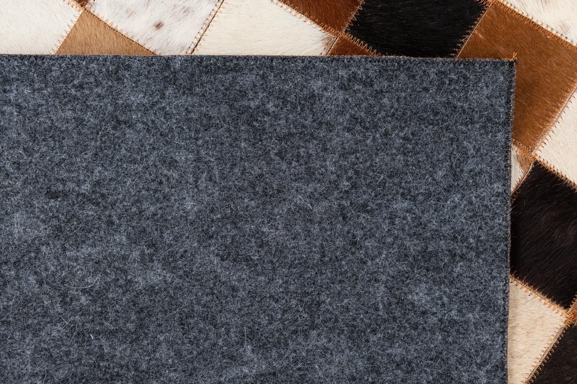 5' 1 x 8' 1 Cowhide Leather Rug