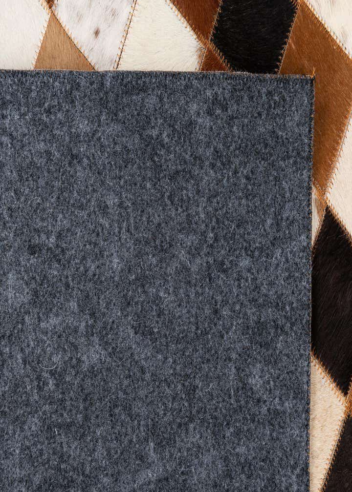 5' 1 x 8' 1 Cowhide Leather Rug