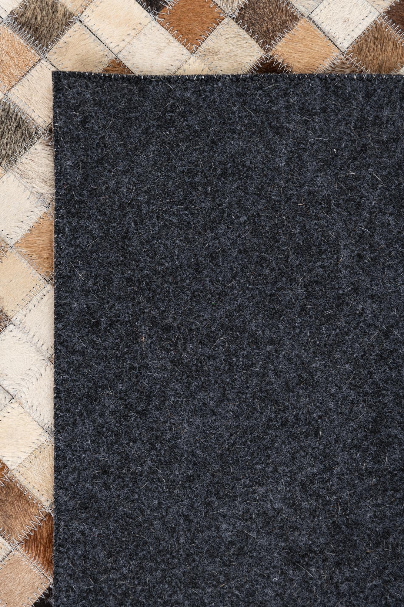 5' 1 x 8' 1 Cowhide Leather Rug