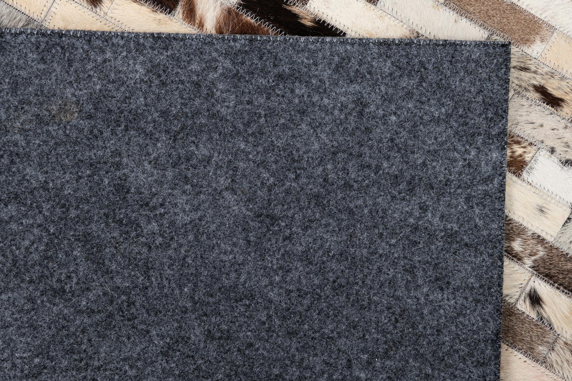 5' x 7' 10 Cowhide Leather Rug