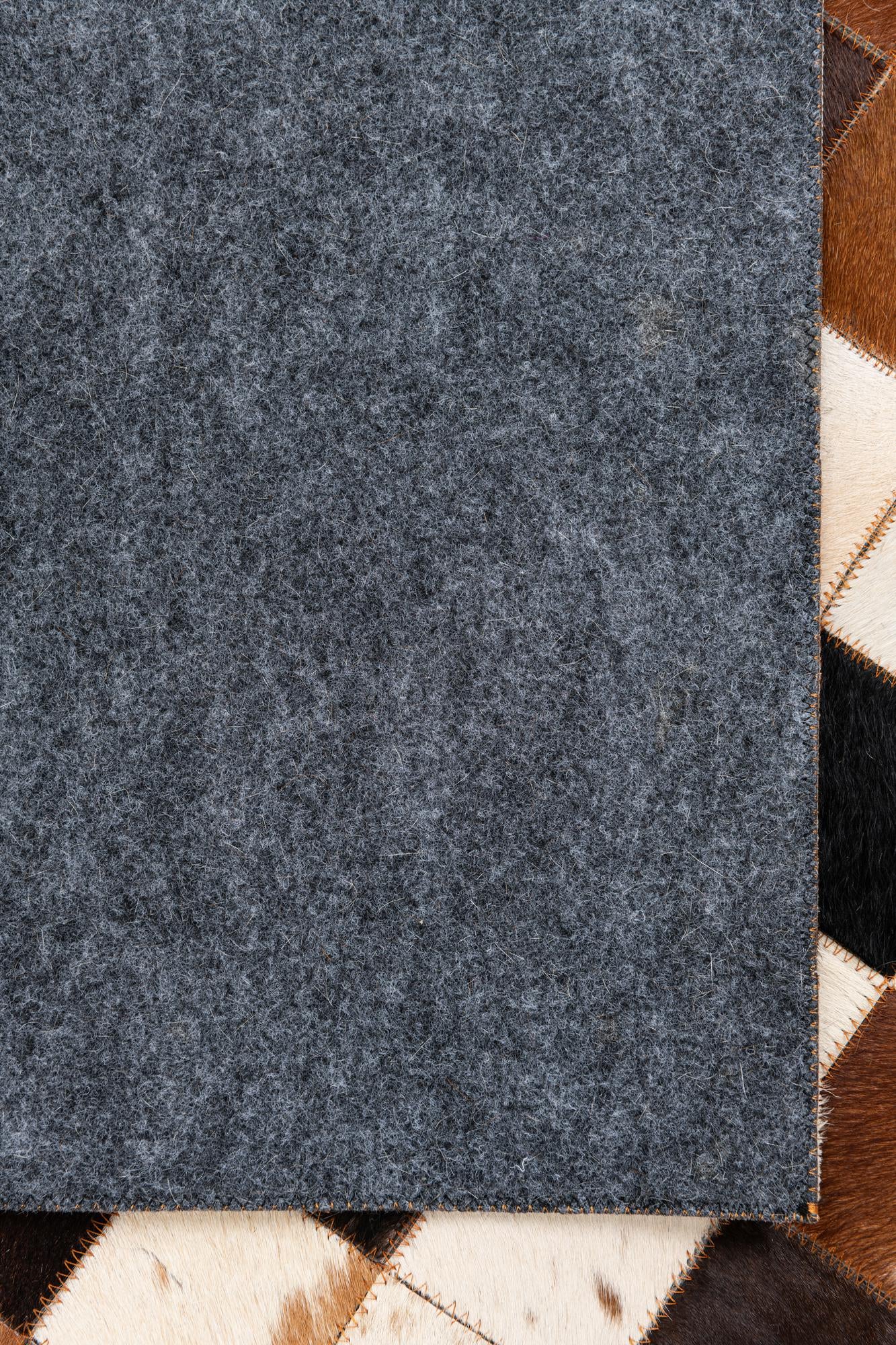 5' 1 x 8' 1 Cowhide Leather Rug