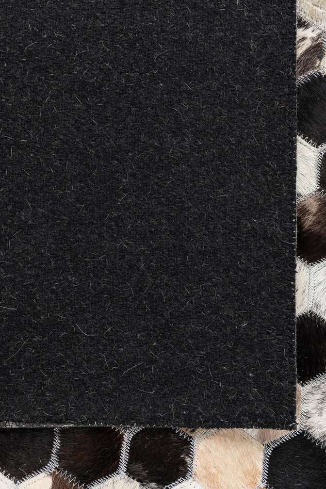 5' 2 x 8' 1 Cowhide Leather Rug