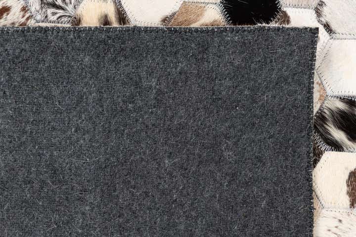 5' 1 x 8' 1 Cowhide Leather Rug