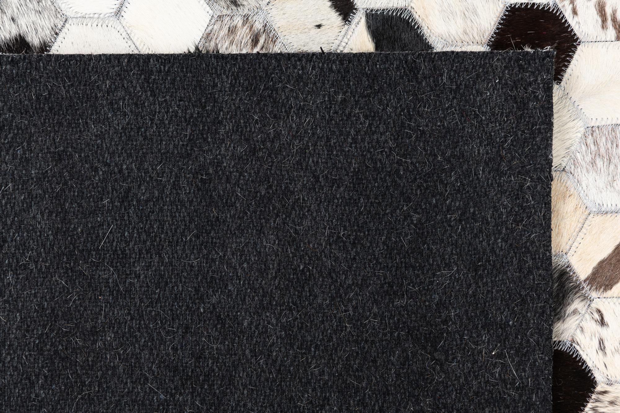 5' 1 x 8' 1 Cowhide Leather Rug