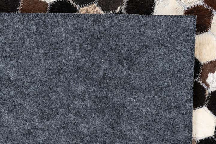 5' 2 x 7' 9 Cowhide Leather Rug