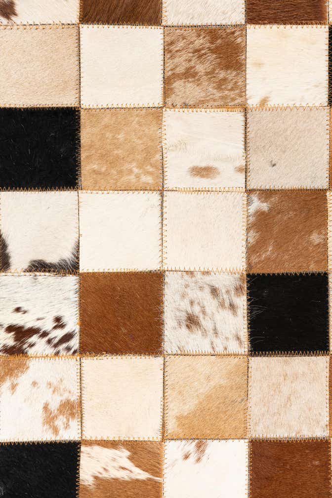 5' 1 x 8' 1 Cowhide Leather Rug