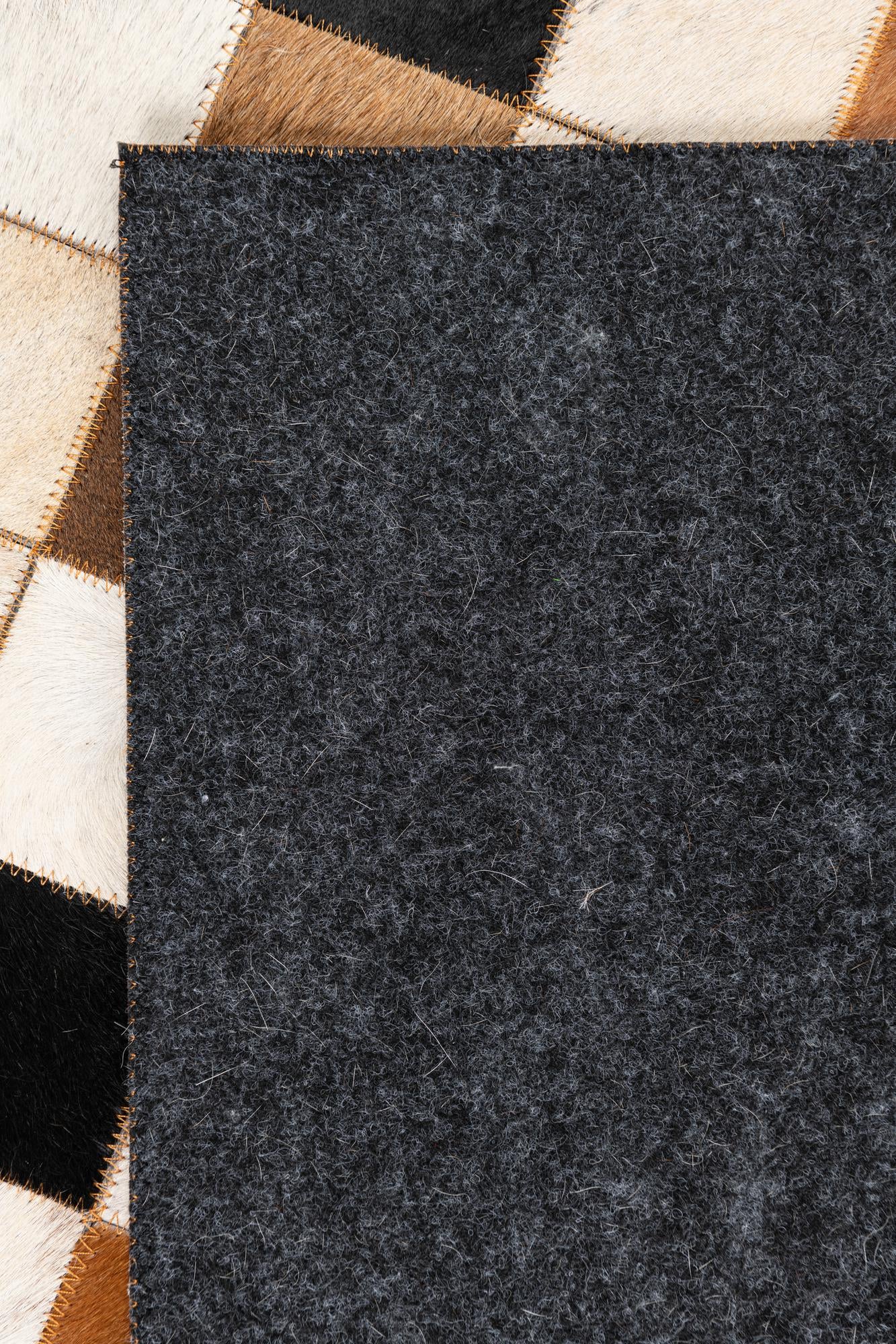 5' 1 x 8' 1 Cowhide Leather Rug