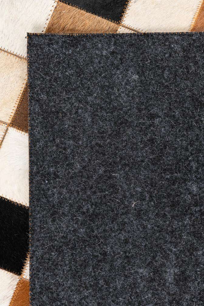 5' 1 x 8' 1 Cowhide Leather Rug