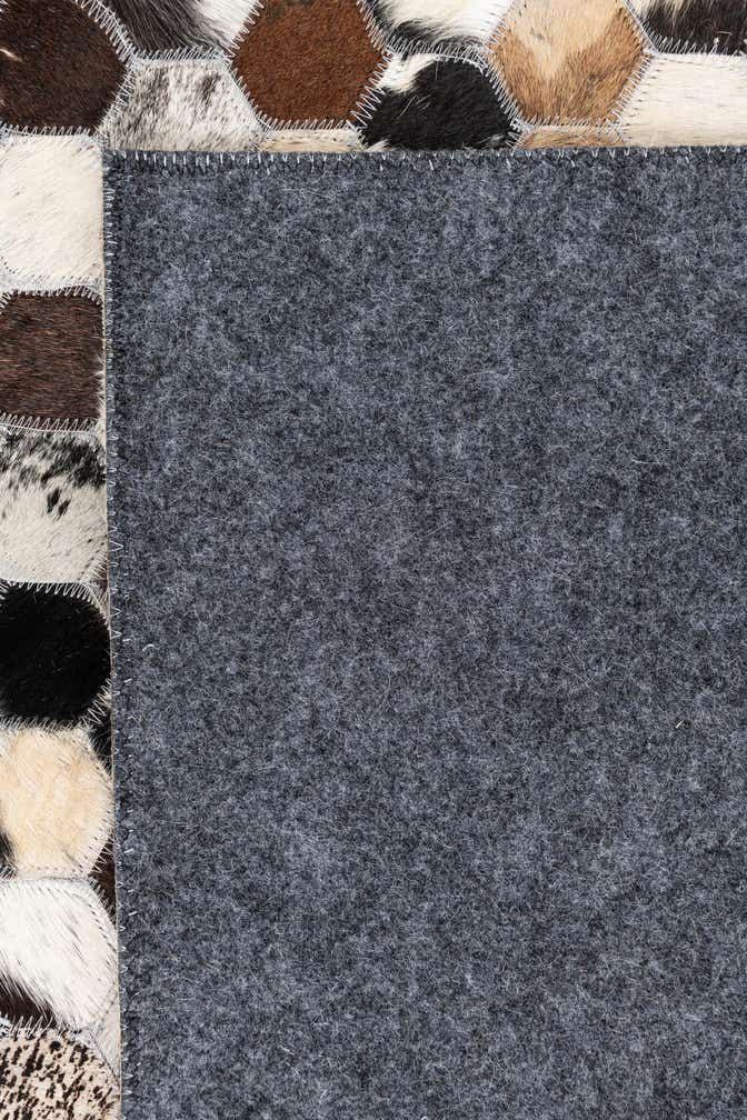 5' 1 x 7' 10 Cowhide Leather Rug