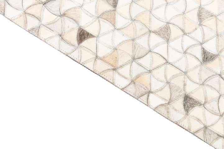 5' 1 x 8' 1 Cowhide Leather Rug