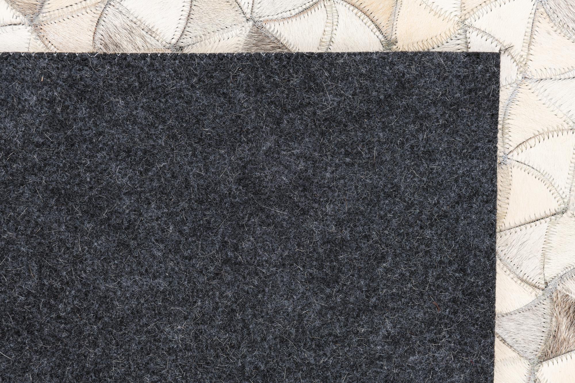 5' 1 x 8' 1 Cowhide Leather Rug