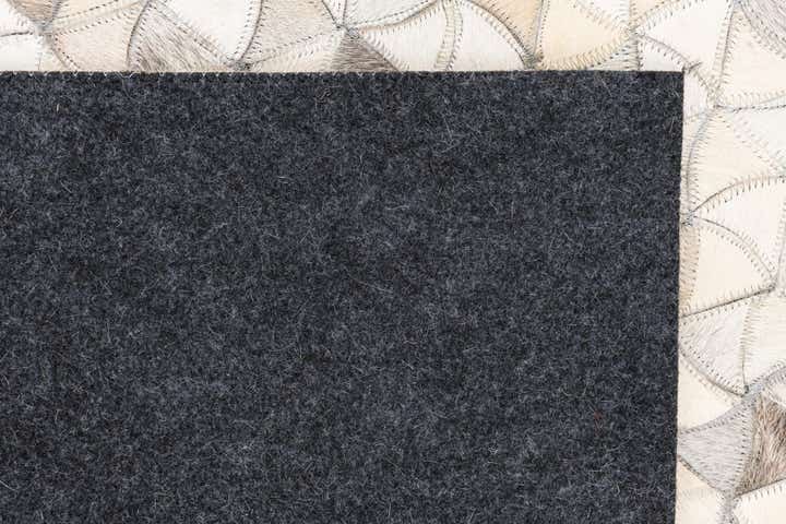 5' 1 x 8' 1 Cowhide Leather Rug