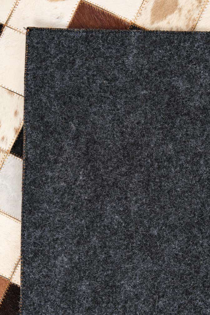 5' 1 x 8' 1 Cowhide Leather Rug