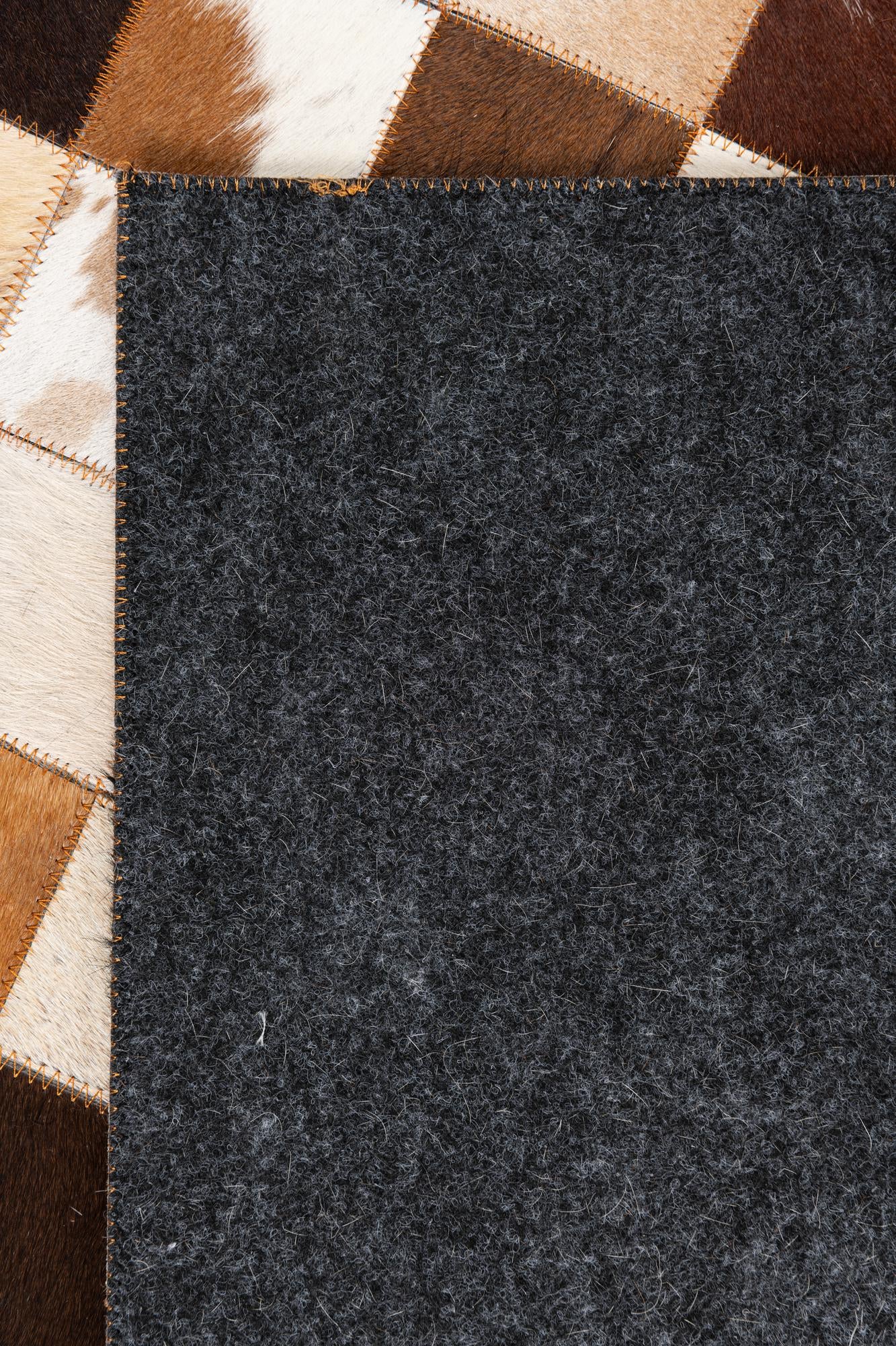 5' 1 x 8' 1 Cowhide Leather Rug