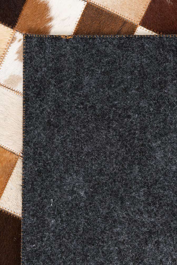 5' 1 x 8' 1 Cowhide Leather Rug