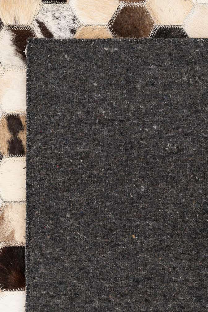 5' 1 x 7' 10 Cowhide Leather Rug