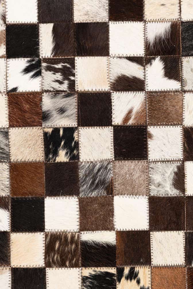 5' 1 x 8' 2 Cowhide Leather Rug