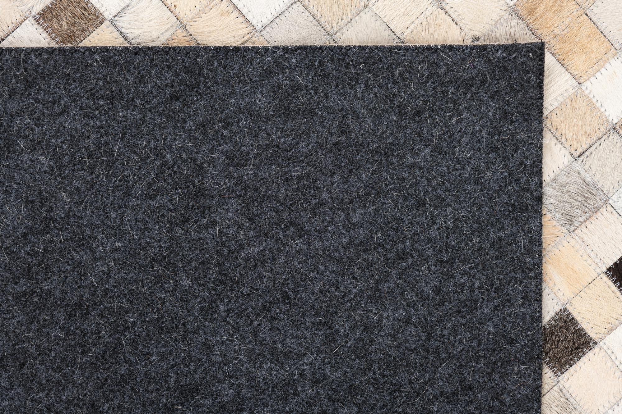 5' 1 x 8' 1 Cowhide Leather Rug