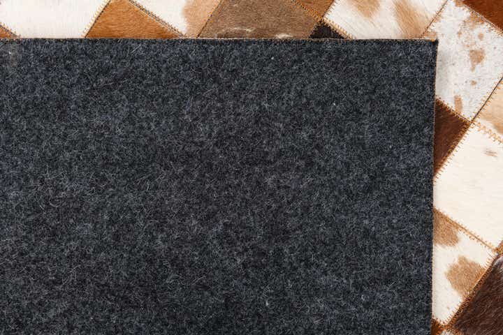5' 1 x 8' 1 Cowhide Leather Rug
