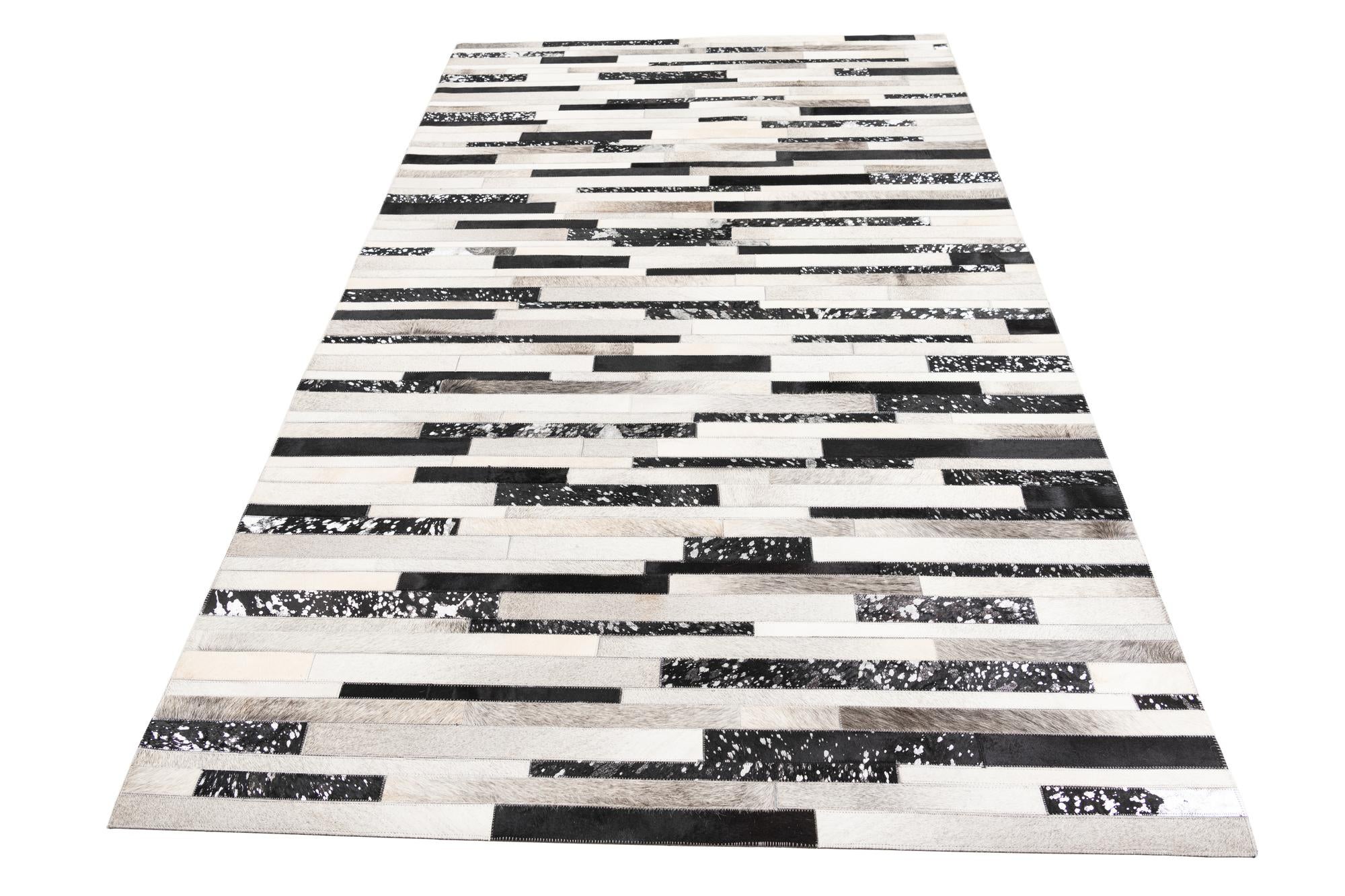 5' 1 x 8' 2 Cowhide Leather Rug