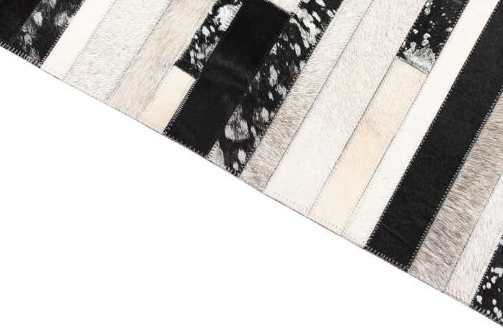 5' 1 x 8' 2 Cowhide Leather Rug