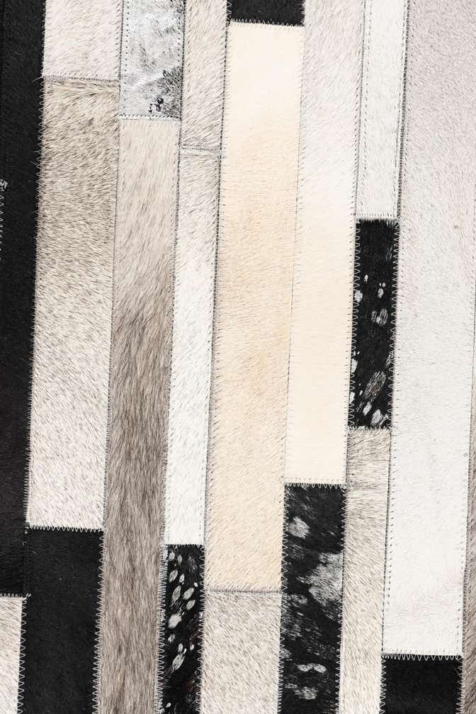 5' 1 x 8' 2 Cowhide Leather Rug