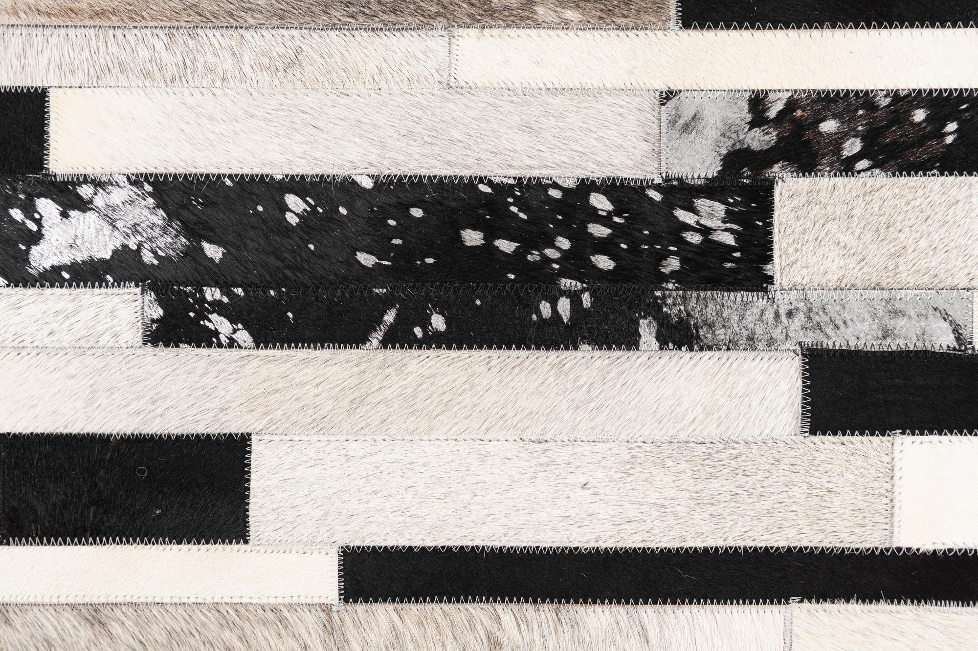 5' 1 x 8' 2 Cowhide Leather Rug