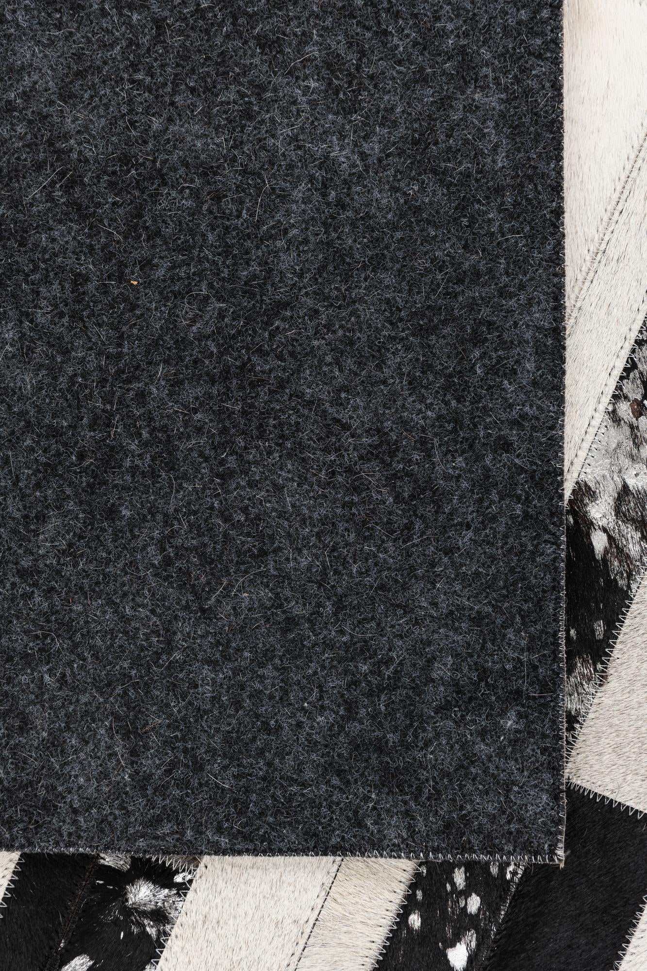 5' 1 x 8' 2 Cowhide Leather Rug