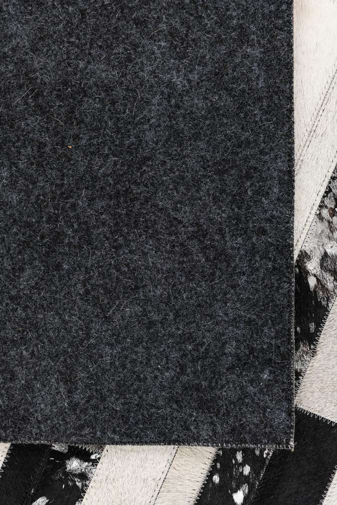 5' 1 x 8' 2 Cowhide Leather Rug