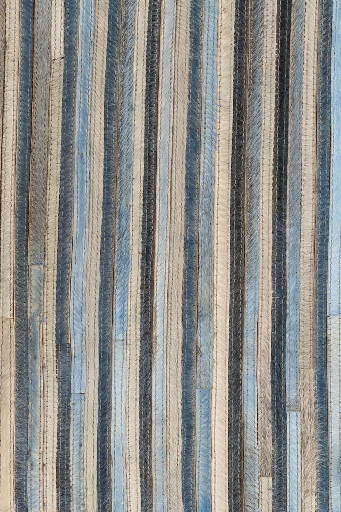 5' 1 x 7' 5 Cowhide Leather Rug