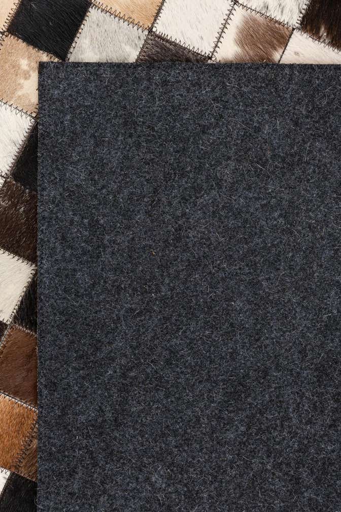 5' 1 x 8' 2 Cowhide Leather Rug