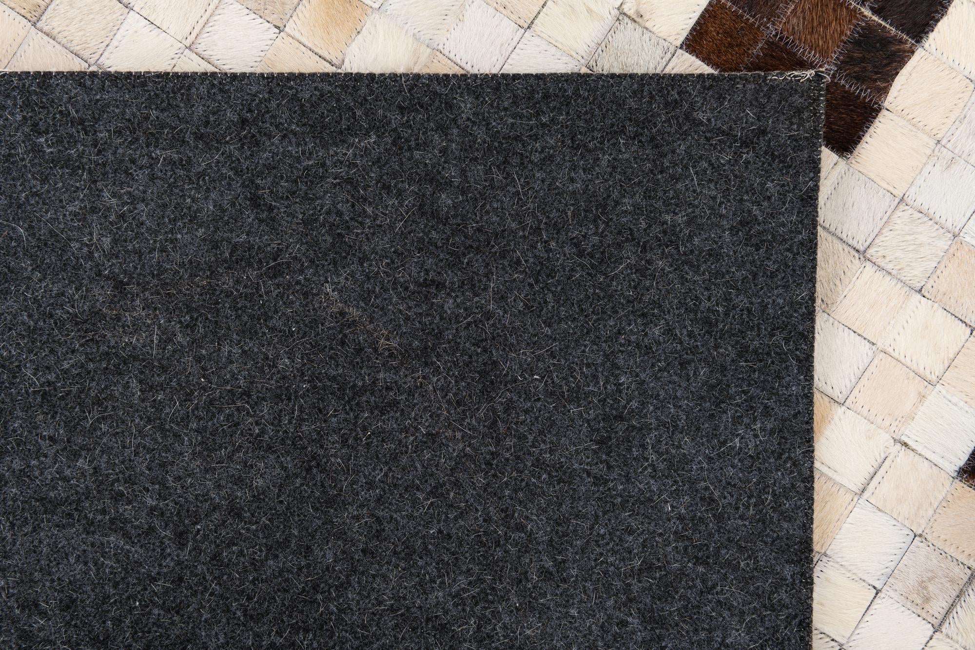 5' 3 x 8' 3 Cowhide Leather Rug