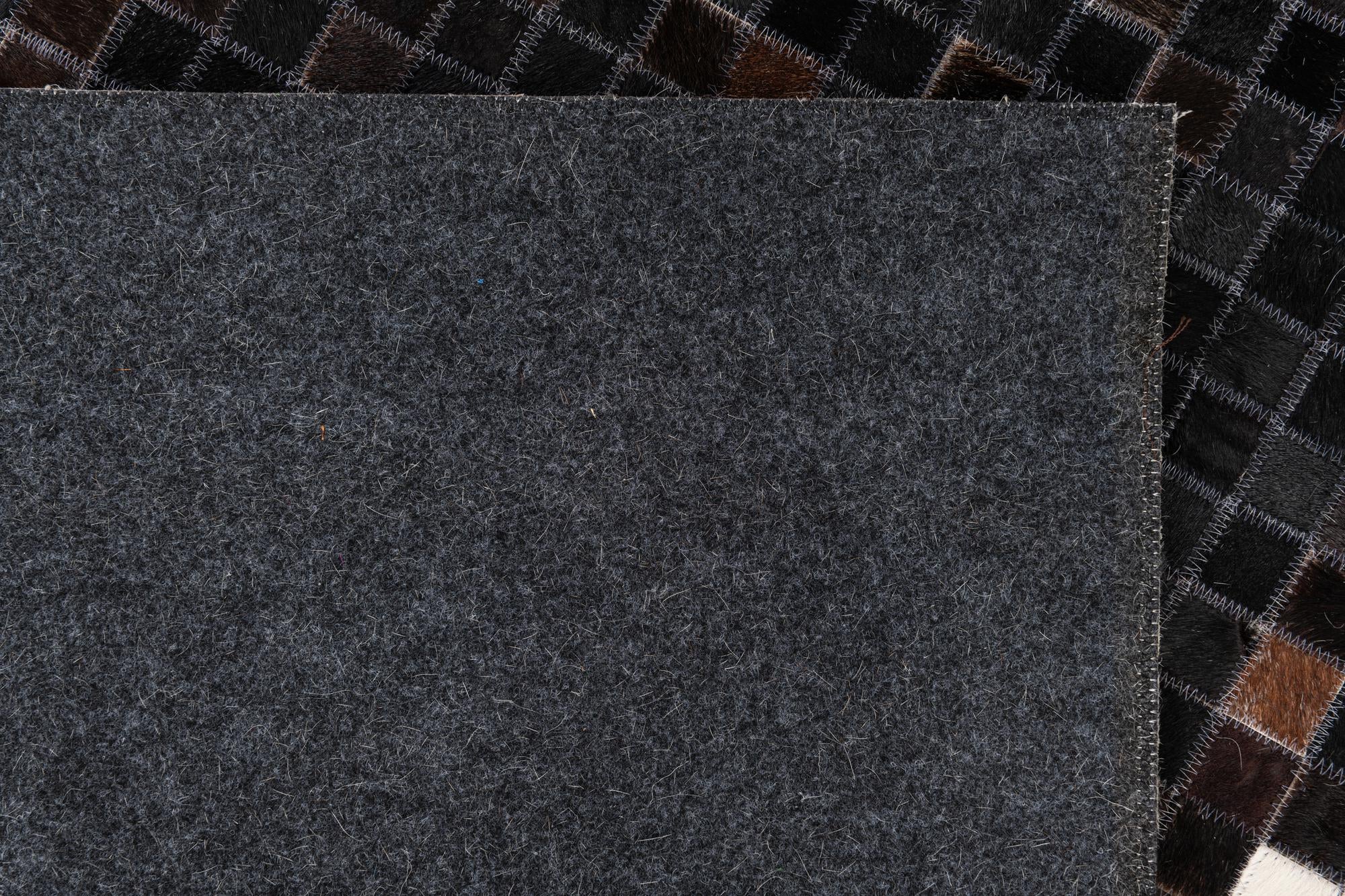 5' 2 x 8' Cowhide Leather Rug