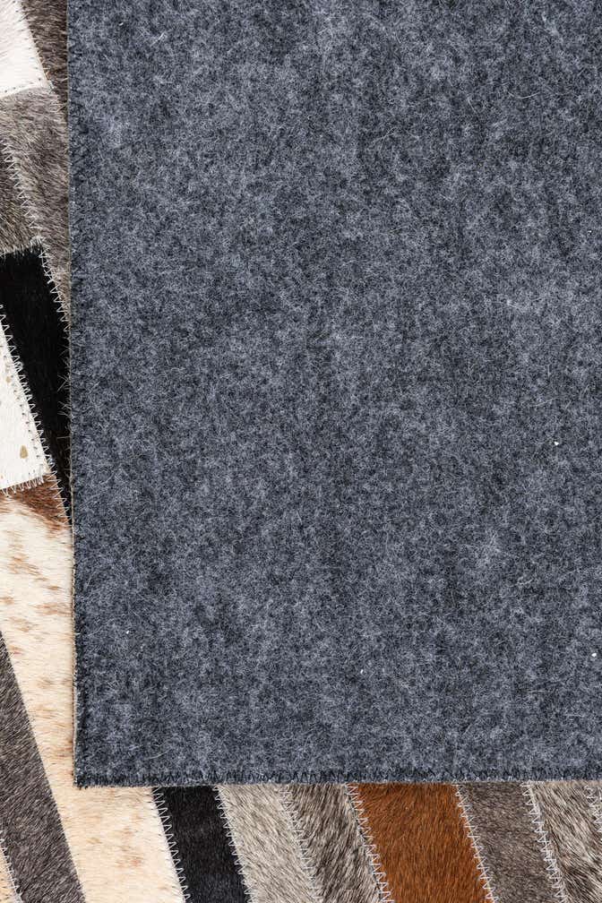 5' x 7' 9 Cowhide Leather Rug