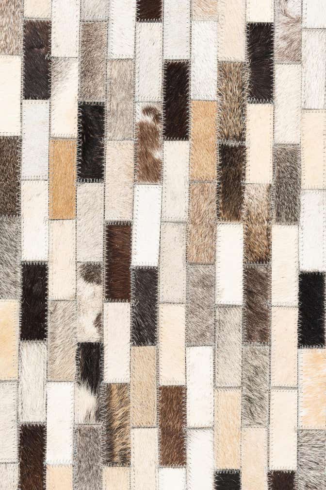 5' x 7' 9 Cowhide Leather Rug