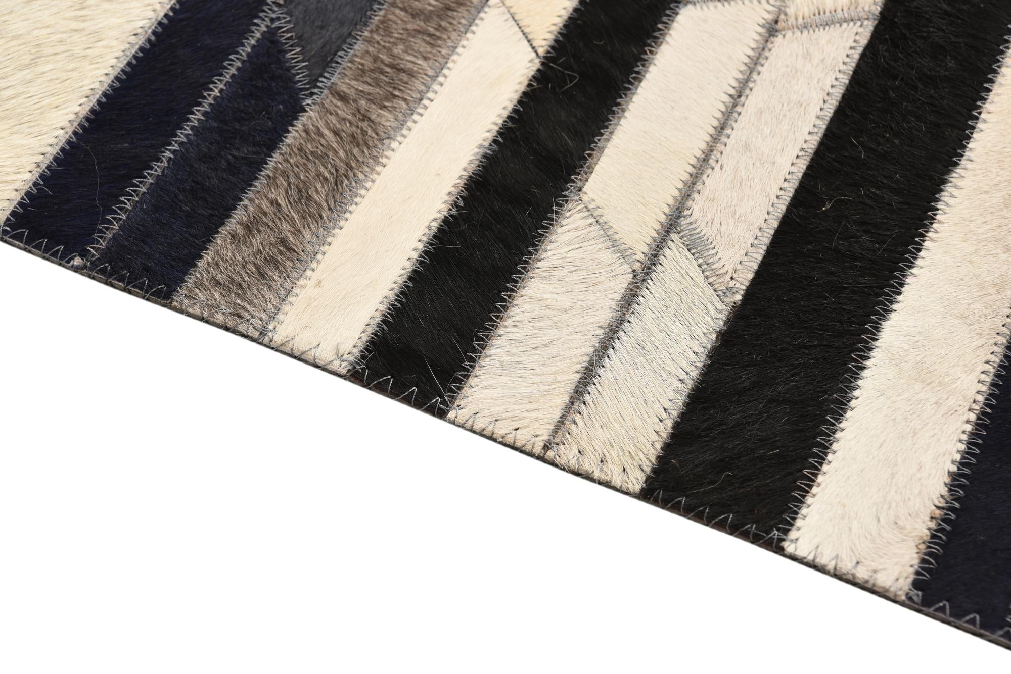 5' 1 x 8' 1 Cowhide Rug