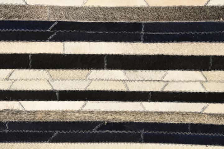 5' 1 x 8' 1 Cowhide Rug