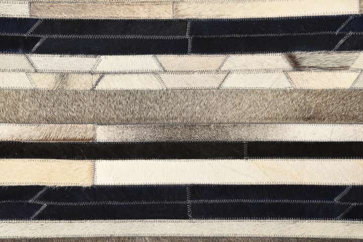 5' 1 x 8' 1 Cowhide Rug