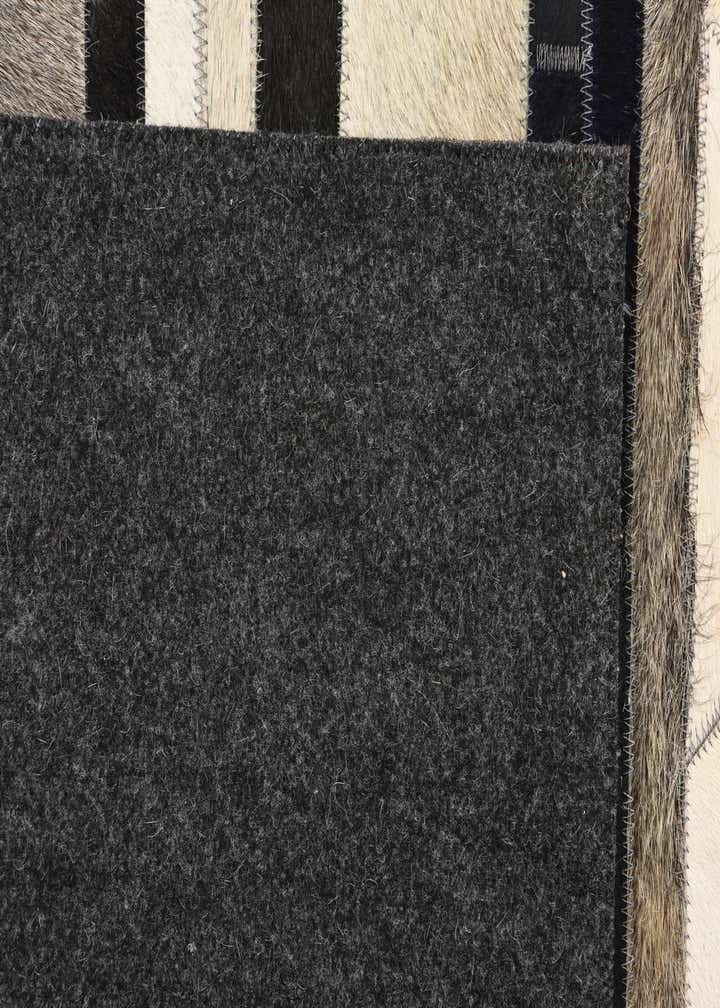 5' 1 x 8' 1 Cowhide Rug