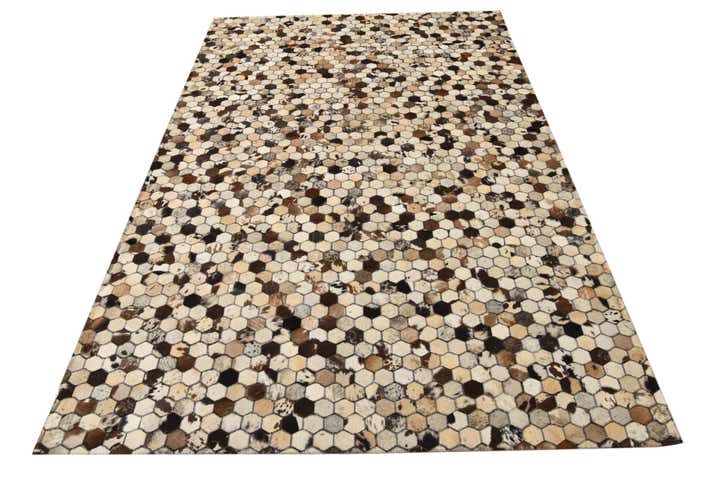 5' 2 x 8' 1 Cowhide Rug