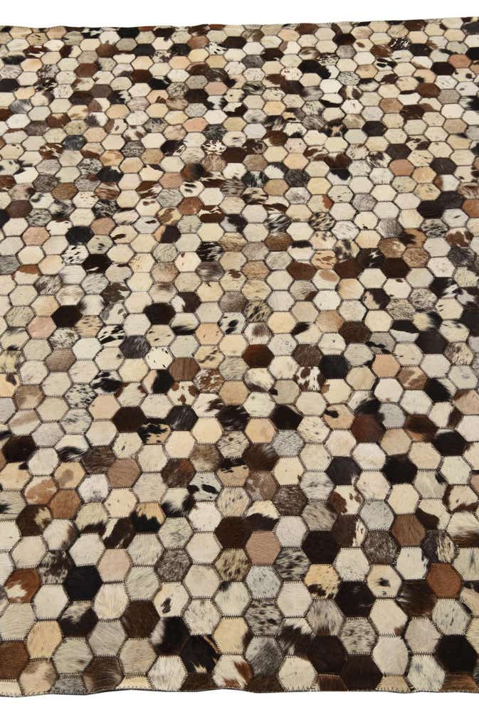5' 2 x 8' 1 Cowhide Rug