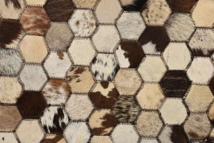 5' 2 x 8' 1 Cowhide Rug