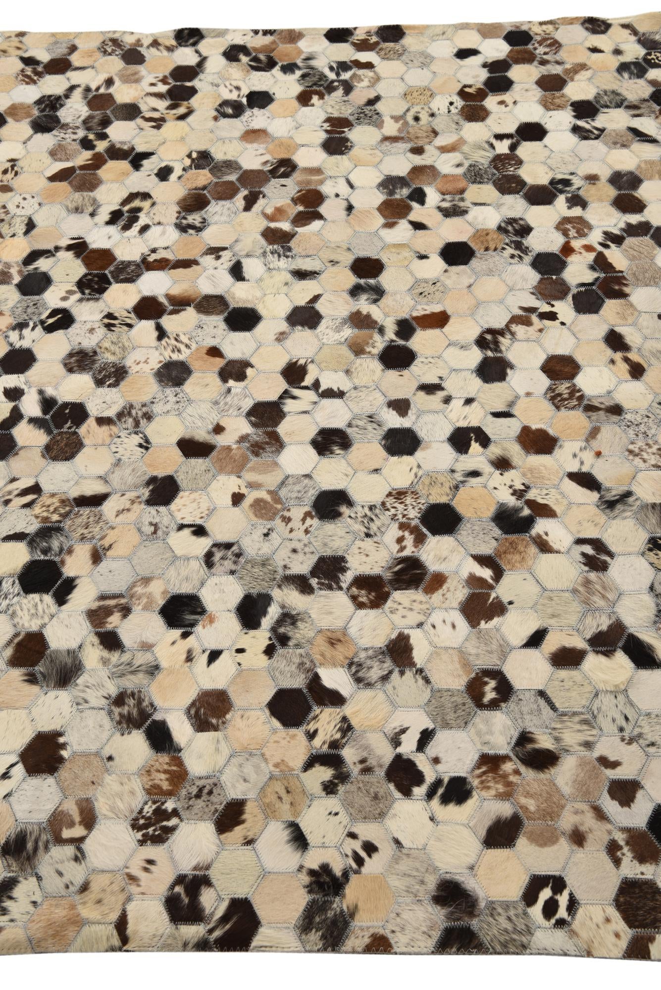 5' 2 x 7' 10 Cowhide Rug