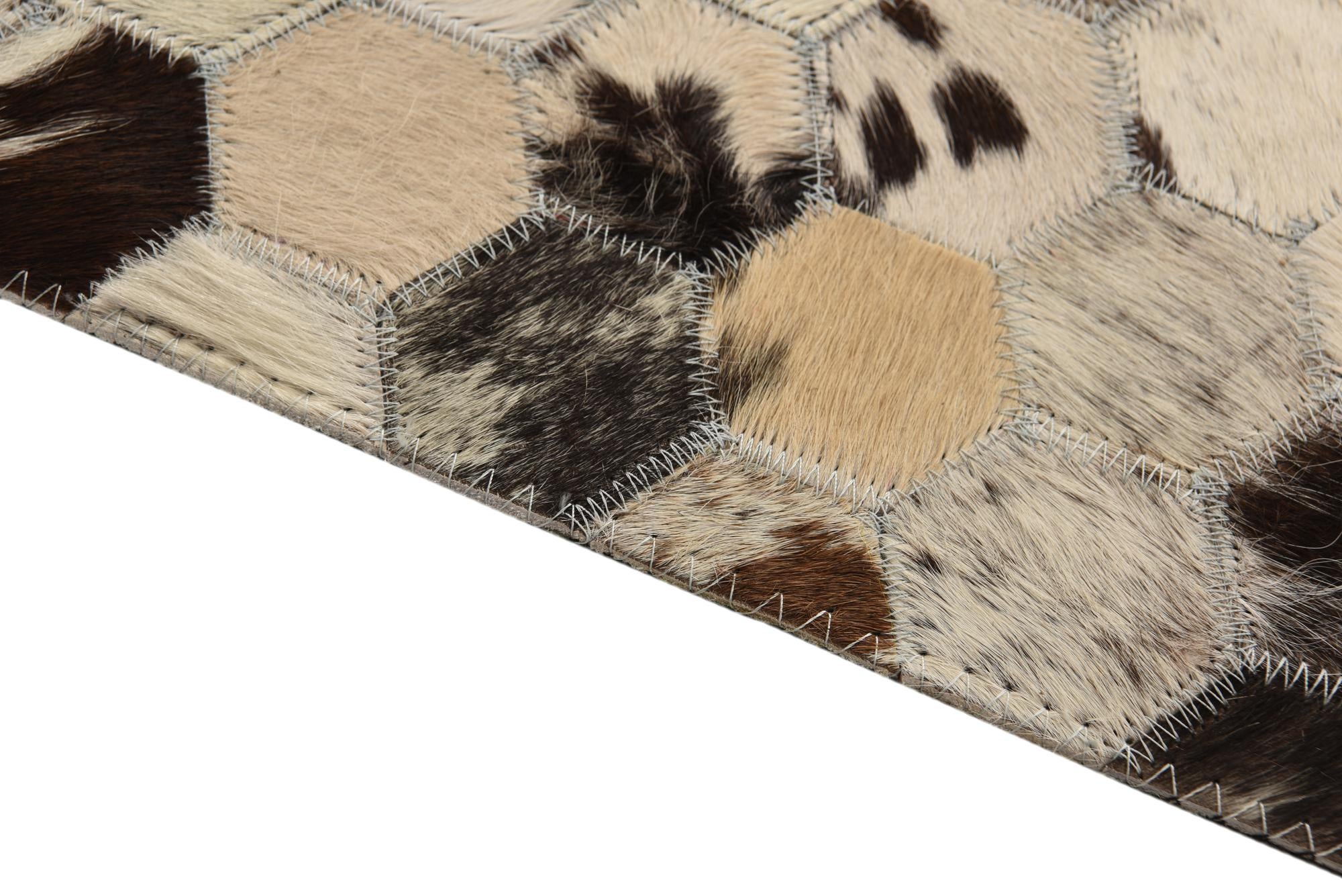5' 2 x 7' 10 Cowhide Rug