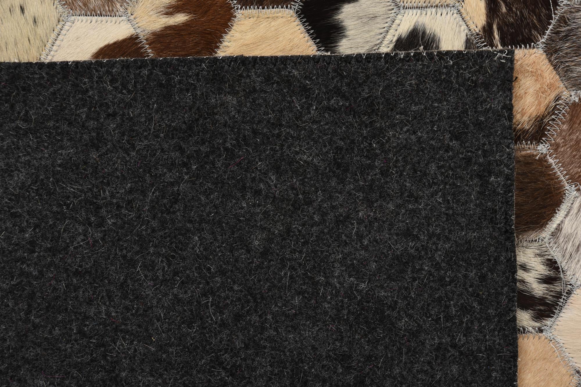 5' 2 x 7' 10 Cowhide Rug