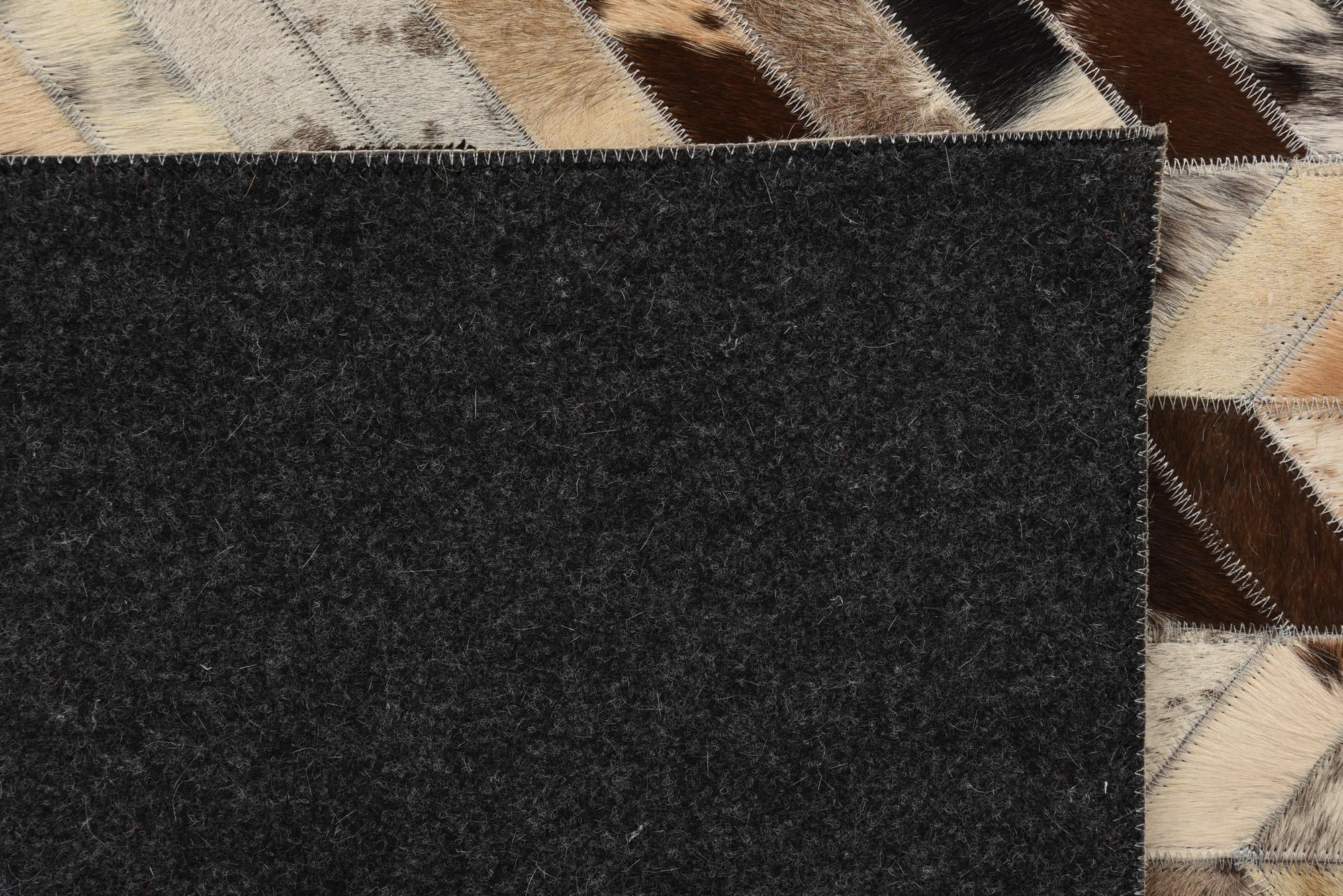 5' 2 x 8' Cowhide Rug